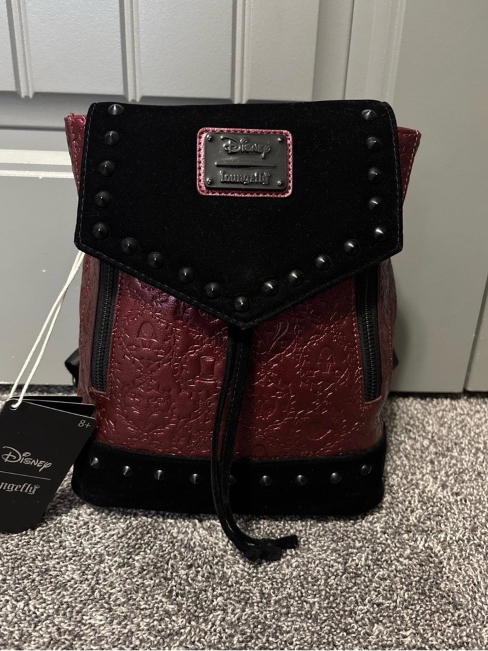 Loungefly Burgundy and Black Villians Embossed Mini Backpack